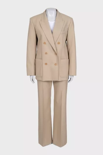 Double-breasted suit in beige