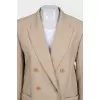 Double-breasted suit in beige