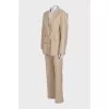 Double-breasted suit in beige