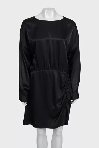 Black dress with a cutout back and draping