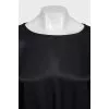 Black dress with a cutout back and draping