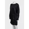 Black dress with a cutout back and draping