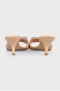 Mules with heels decorated with a bow