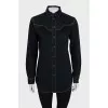 Black denim shirt decorated with fringe