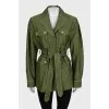 A short, fitted coat with buttons