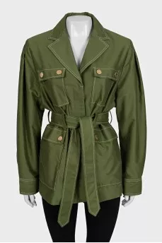 A short, fitted coat with buttons