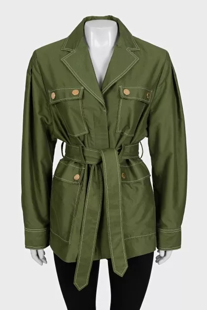 A short, fitted coat with buttons