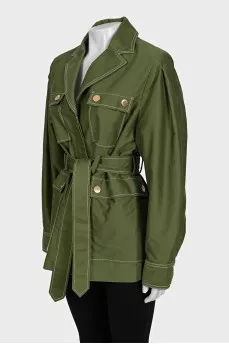 A short, fitted coat with buttons