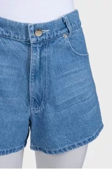 Blue denim shorts with pockets