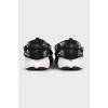 Black textile sneakers decorated with sequins