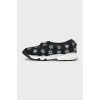 Black textile sneakers decorated with sequins