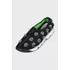 Black textile sneakers decorated with sequins