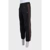 Men's sweatpants with drawstrings and side stripes