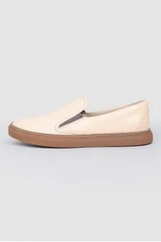 Leather moccasins with brown soles