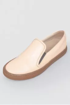 Leather moccasins with brown soles