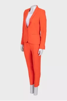 Orange suit with tapered trousers