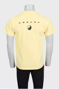 Men's yellow t-shirt with pink print