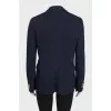Straight jacket with signature blue buttons