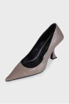 Brown leather shoes with a figured heel