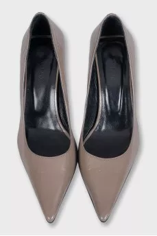 Brown leather shoes with a figured heel