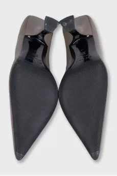 Brown leather shoes with a figured heel
