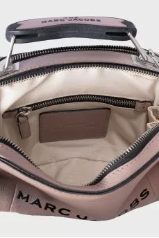 Beige leather bag with black logo
