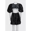 Black embellished dress with an open back