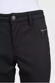 Black tapered trousers with a mid-rise