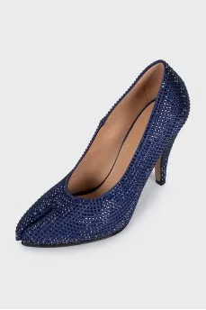 Blue suede shoes decorated with rhinestones