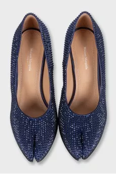 Blue suede shoes decorated with rhinestones