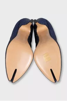 Blue suede shoes decorated with rhinestones
