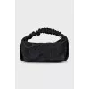 Black mini bag decorated with rhinestones