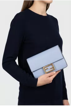 Blue crossbody with a massive logo
