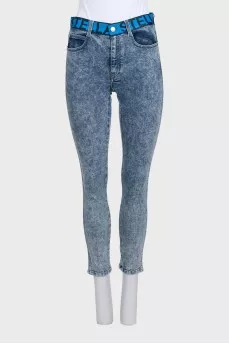 Blue jeans with a signature print