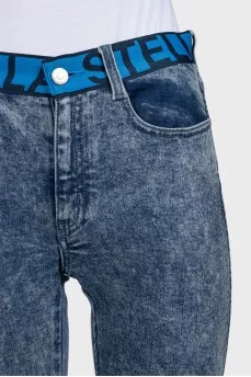 Blue jeans with a signature print