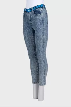 Blue jeans with a signature print
