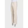 Men's beige button-down jeans