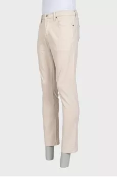 Men's beige button-down jeans