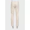 Men's beige button-down jeans