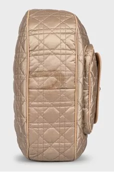 Beige fabric bag with a branded pendant