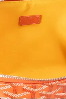 Orange cosmetic bag made from signature canvas