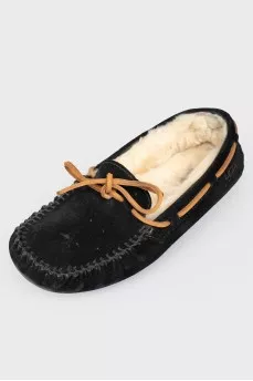Insulated black moccasins on fur