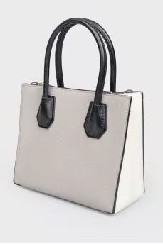 Gray leather bag with white inserts