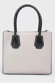 Gray leather bag with white inserts