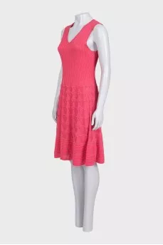 Fitted pink dress with perforations