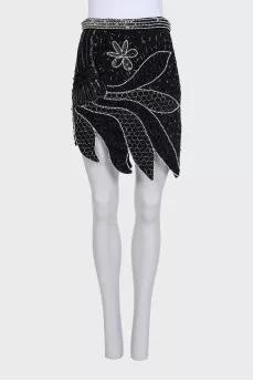Mini skirt decorated with beads