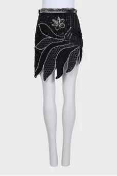 Mini skirt decorated with beads