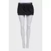Black shorts with leather inserts