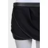 Black shorts with leather inserts