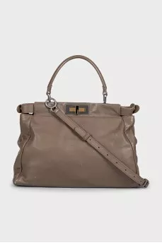 Leather bag with twist lock